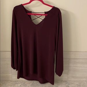 Dark purple shirt with open back